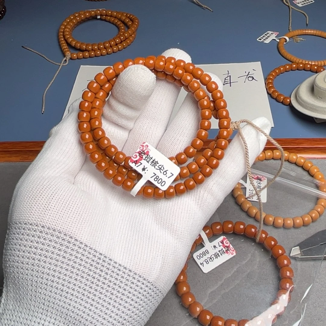 橄榄核手串6.7A7老挝核尖长串