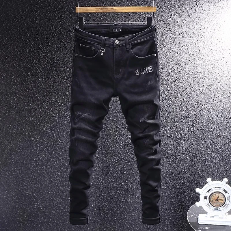 臣吾春夏季新款高端潮流黑色刺绣牛仔裤男帅气青年个性磨破修身裤