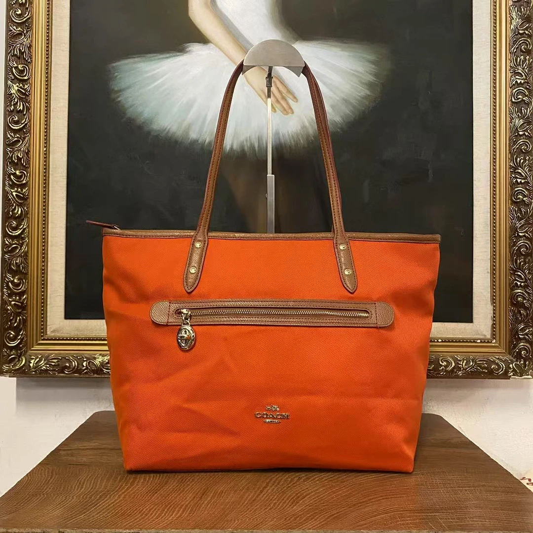 95新 COACH/蔻驰 coach腋下单肩包/001612