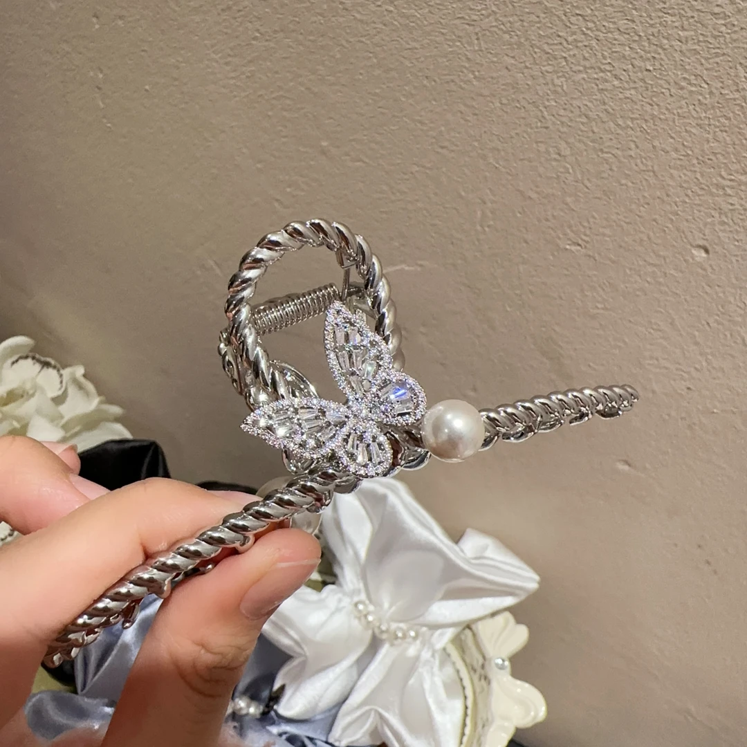 露西闪蝴蝶结抓夹Z119