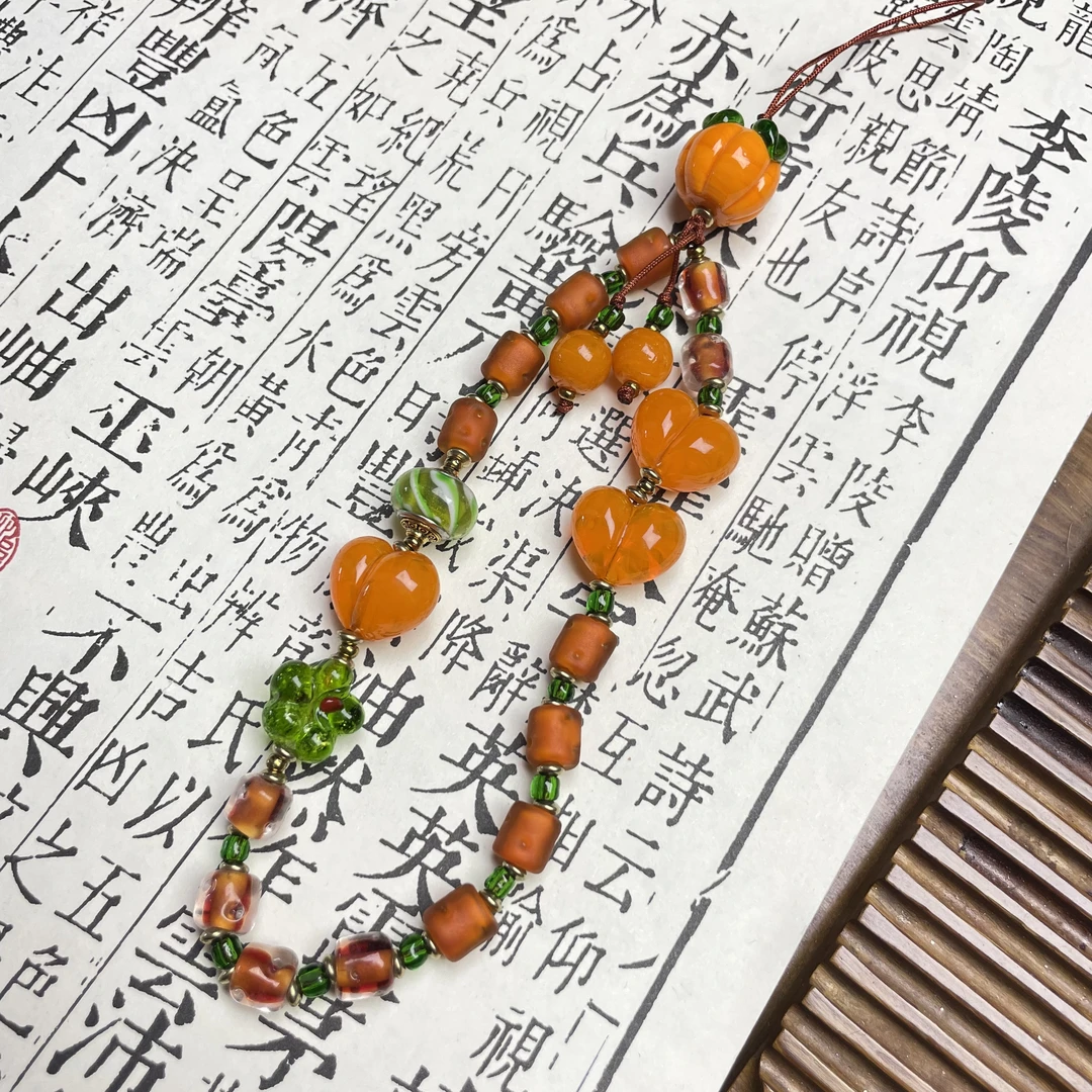 LZ7064 柿柿如意橙色屁桃琉璃手机链
