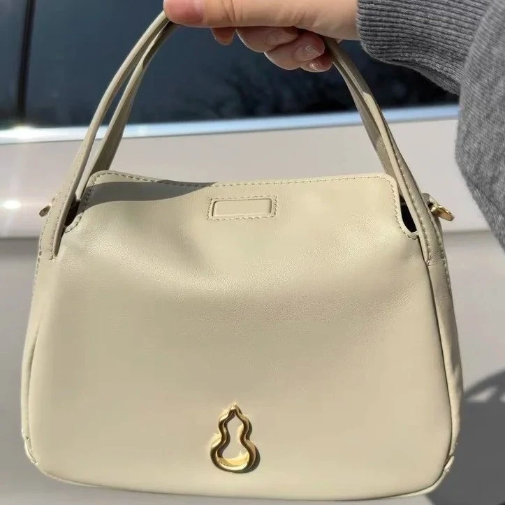 热卖新品圆满包小号头层牛皮菜篮子包女通勤百搭小众手提包斜挎包