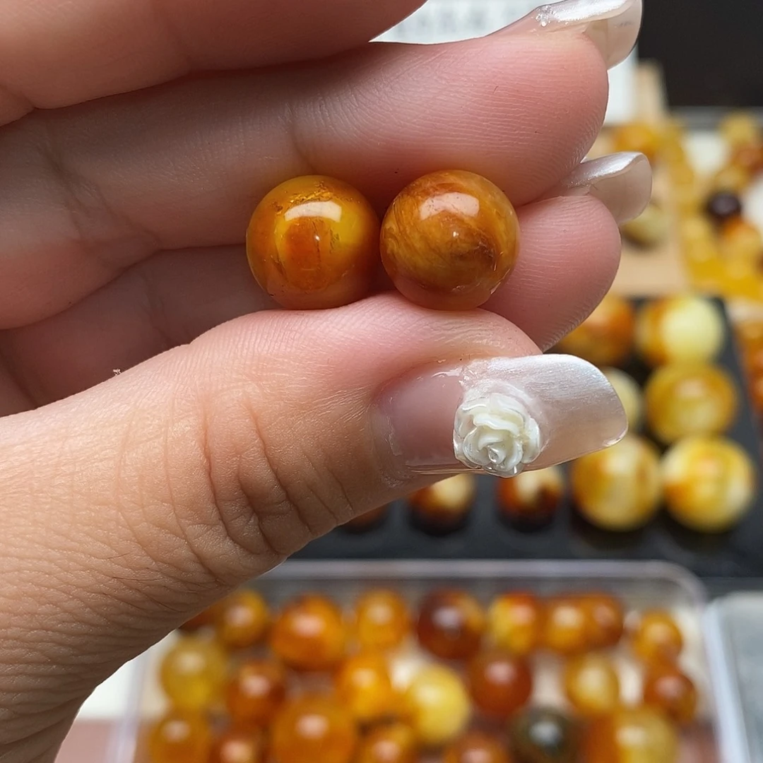 ****姨裸石虫珀未镶嵌蜜蜡