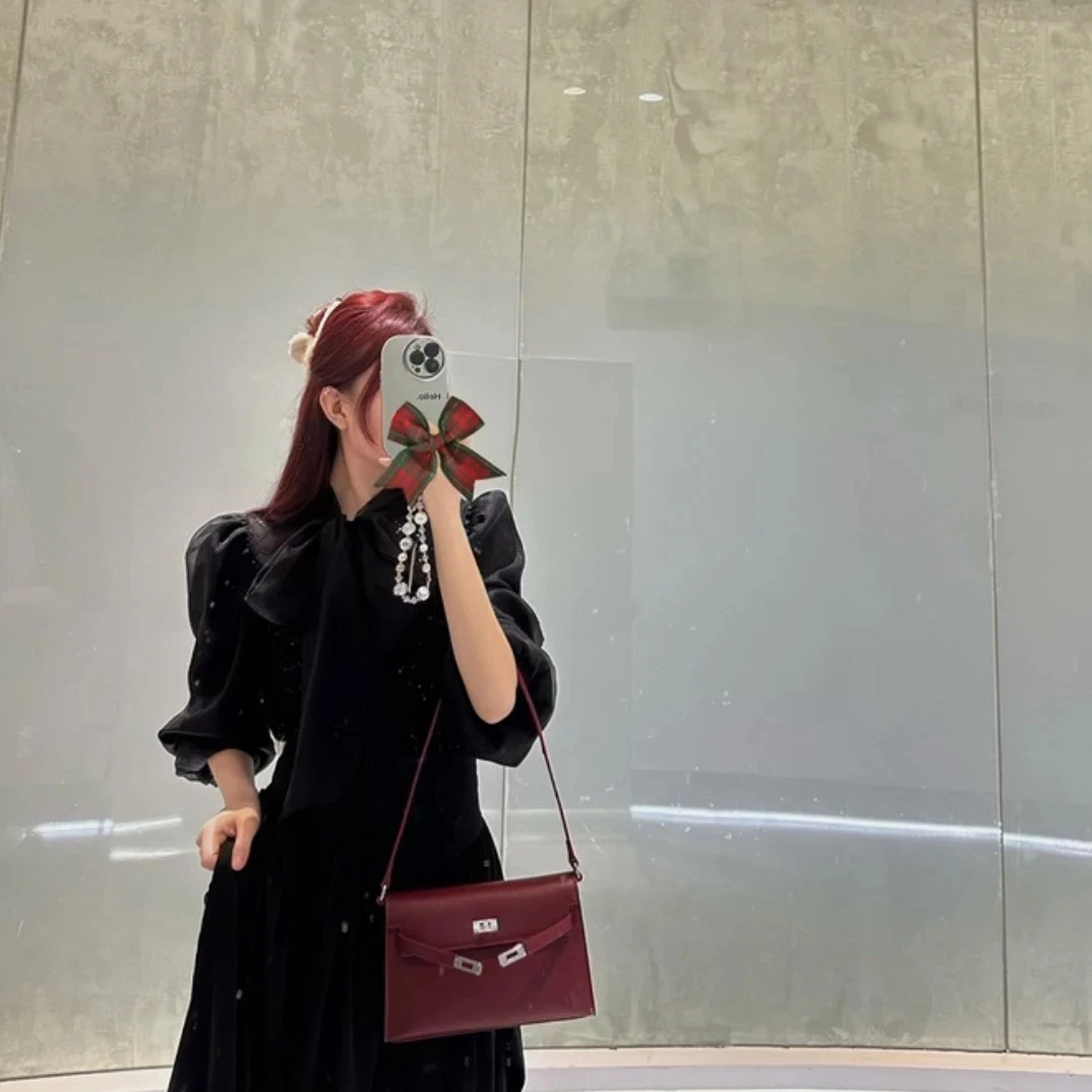 通勤百搭显肤上衣春秋新款透视亮钻上衣长袖泡泡袖蝴蝶结