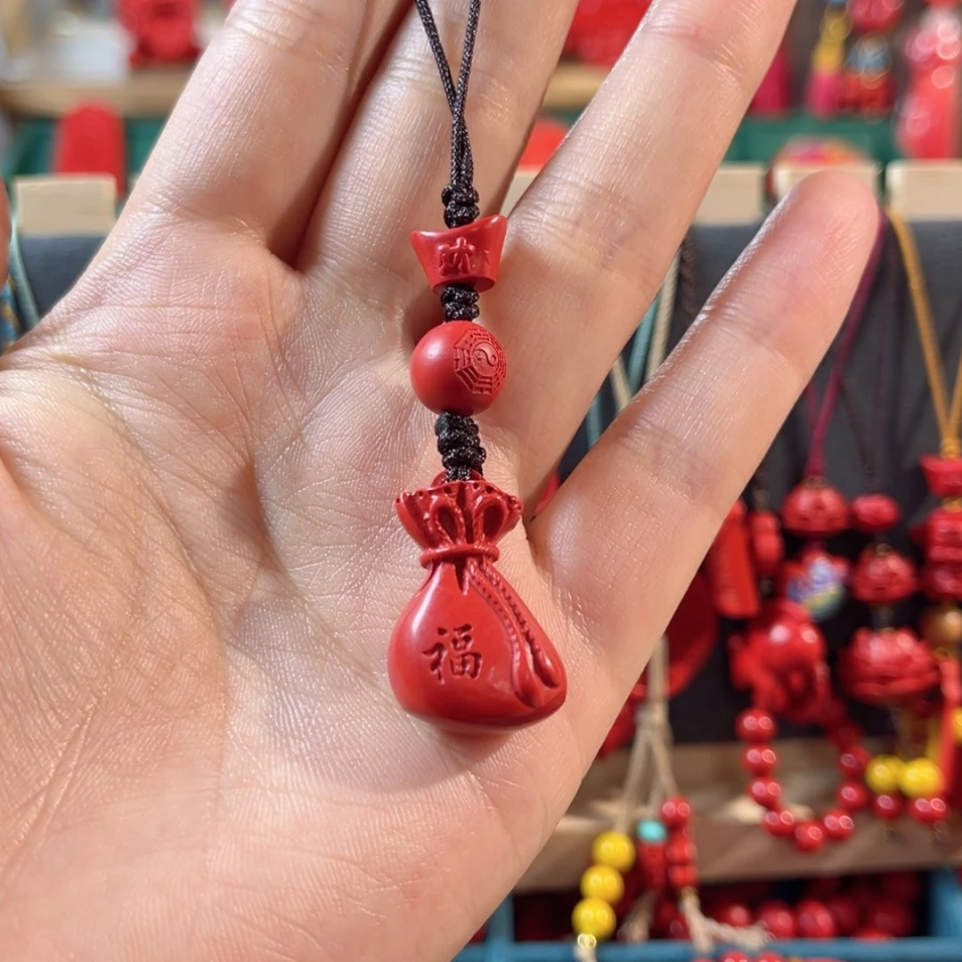 天然辰砂含辰砂工艺品钱袋子手机坠