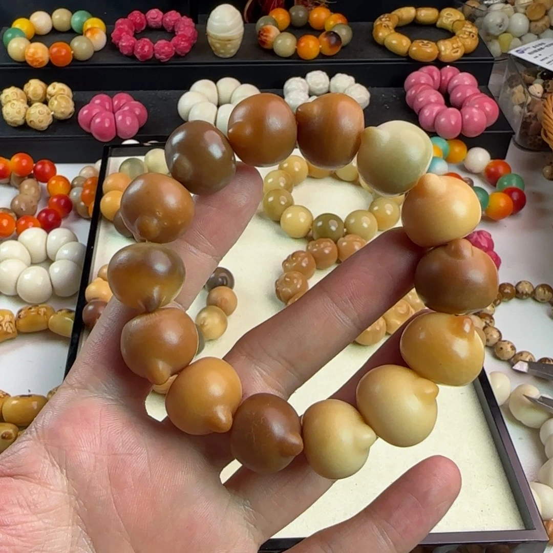 咕***咕菩提根/象牙果吊坠瑕疵卡20猫头手串一条