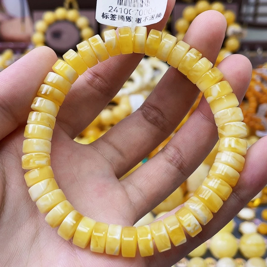 未镶嵌琥珀珠宝奇石8+mm金瓷白妖花 瑕