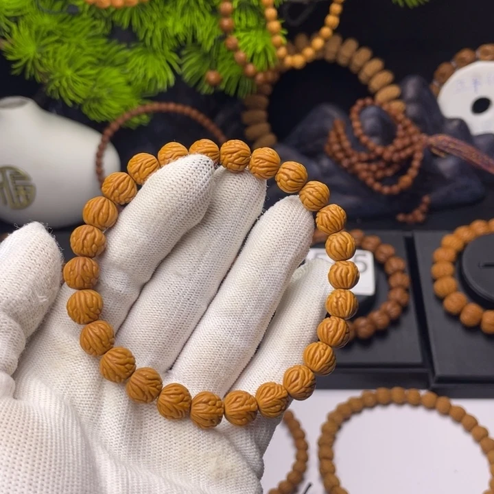 时***.桃核吊坠小金豆0.92