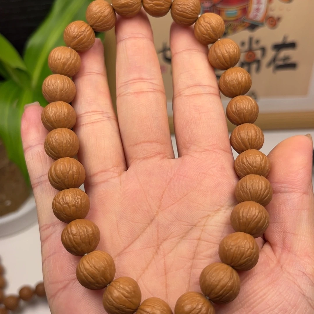 万***力吊坠猴头核桃凤羽