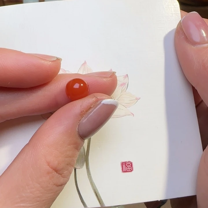 青***面南红玛瑙合金耳饰