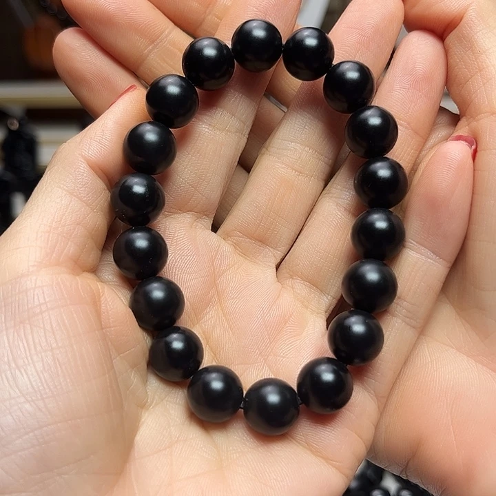 L***T吊坠(赠链)未镶嵌和田玉（墨玉）卡12圆珠高羊脂