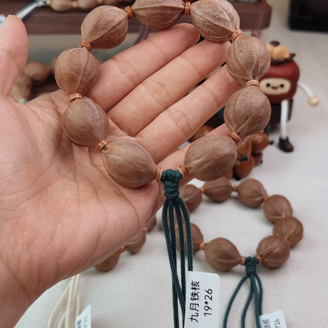 H***S手串橄榄核19*26三花核串