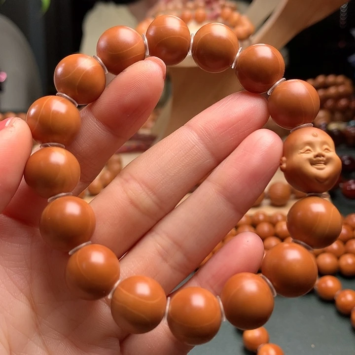 奋***生橄榄核手串1.4水晶核