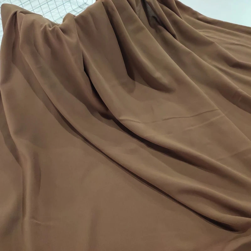 纯驼棕色 纯色雕印棉绸布料 素色人造棉绵绸 凉爽服装连衣裙面料
