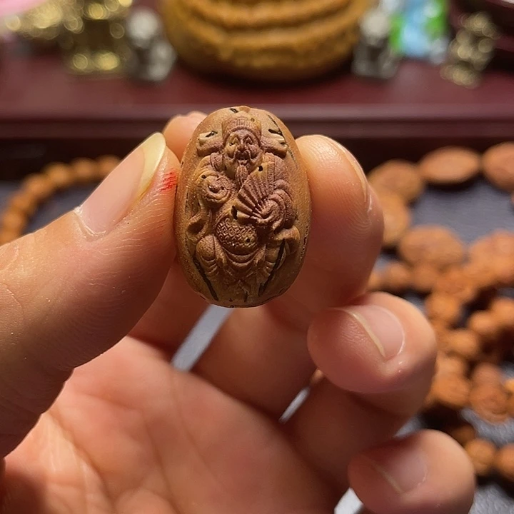 大桃核雕刻财神单籽