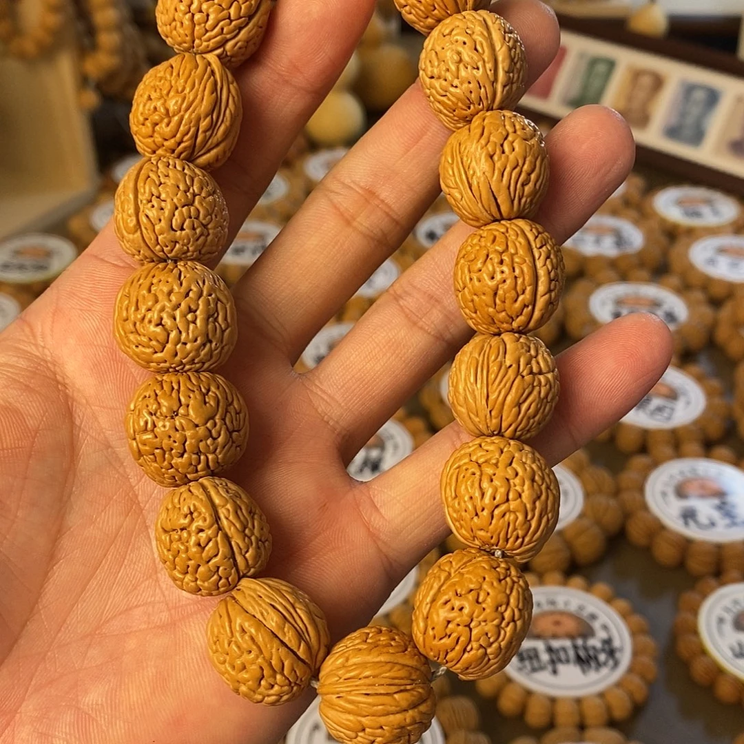 龙鳞纹柳叶大手持桃核