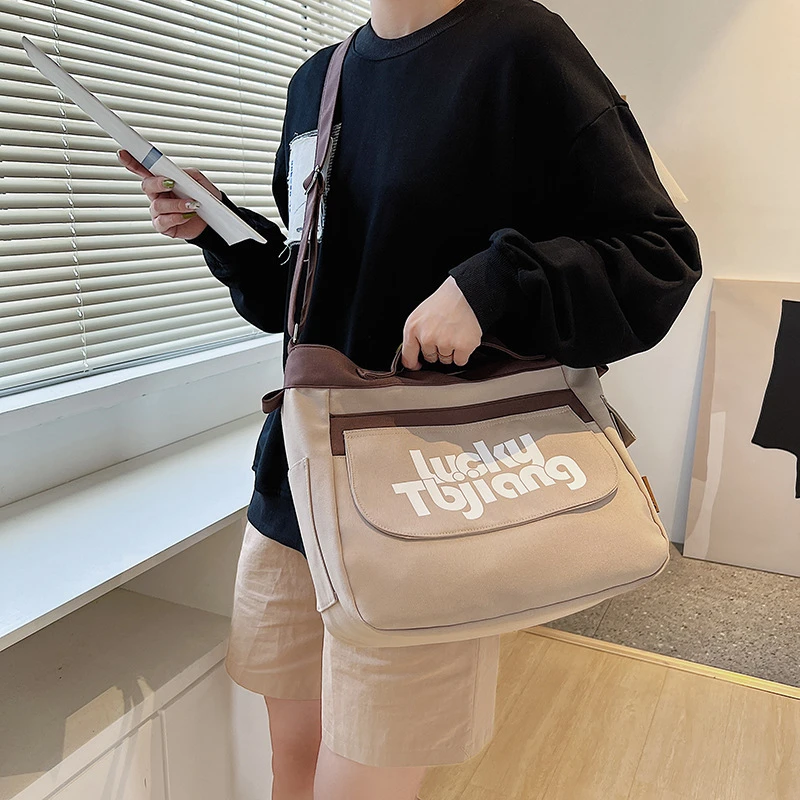 2023新款帆布包大容量斜挎包韩版女生休闲字母单肩包大学生上课包