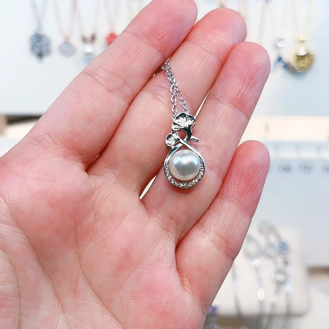 痴****吊坠(赠链)足银镶嵌淡水珍珠