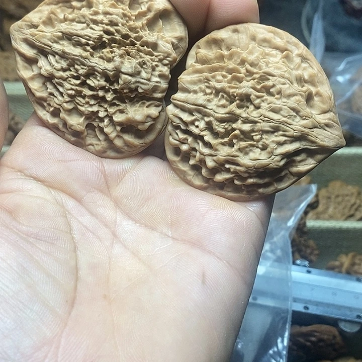 张***胡吊坠桃核送打底官帽压扁一对