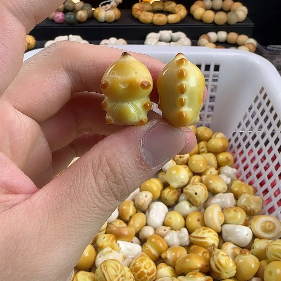 菩提根/象牙果手串微瑕疵炭烤奶龙5颗