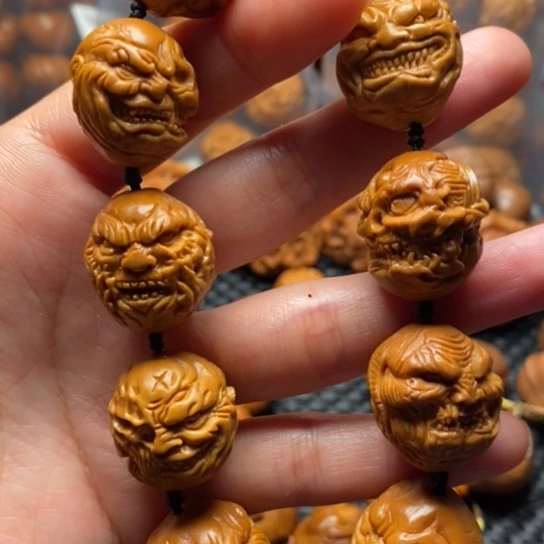 橄榄核吊坠向死而生