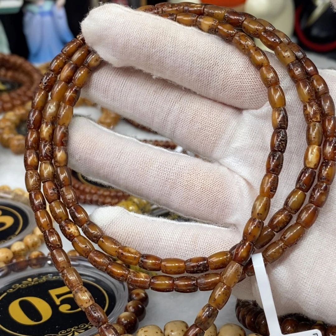 6***.吊坠星月菩提7/5黑金胶囊枣珠