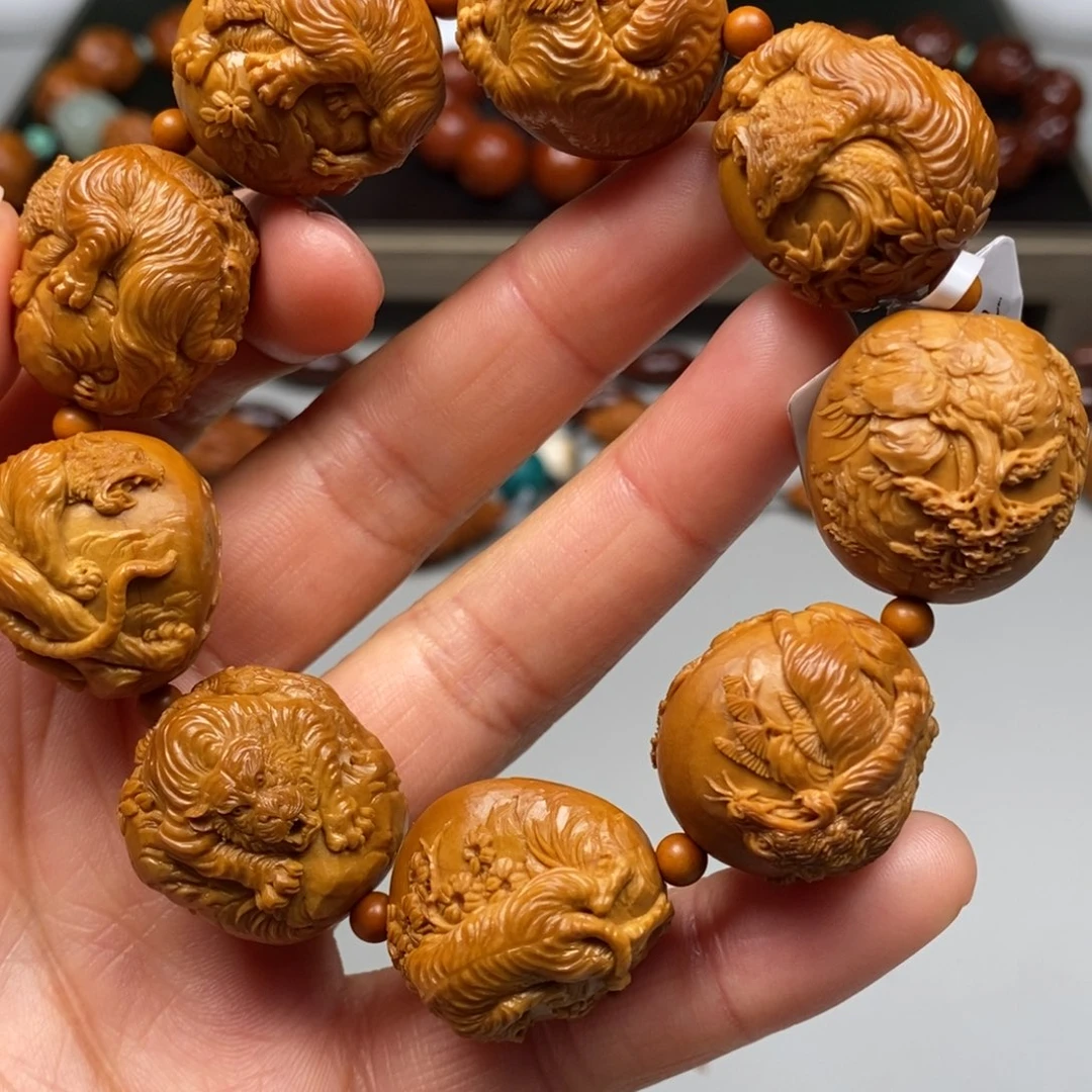 橄榄核吊坠虎啸山林