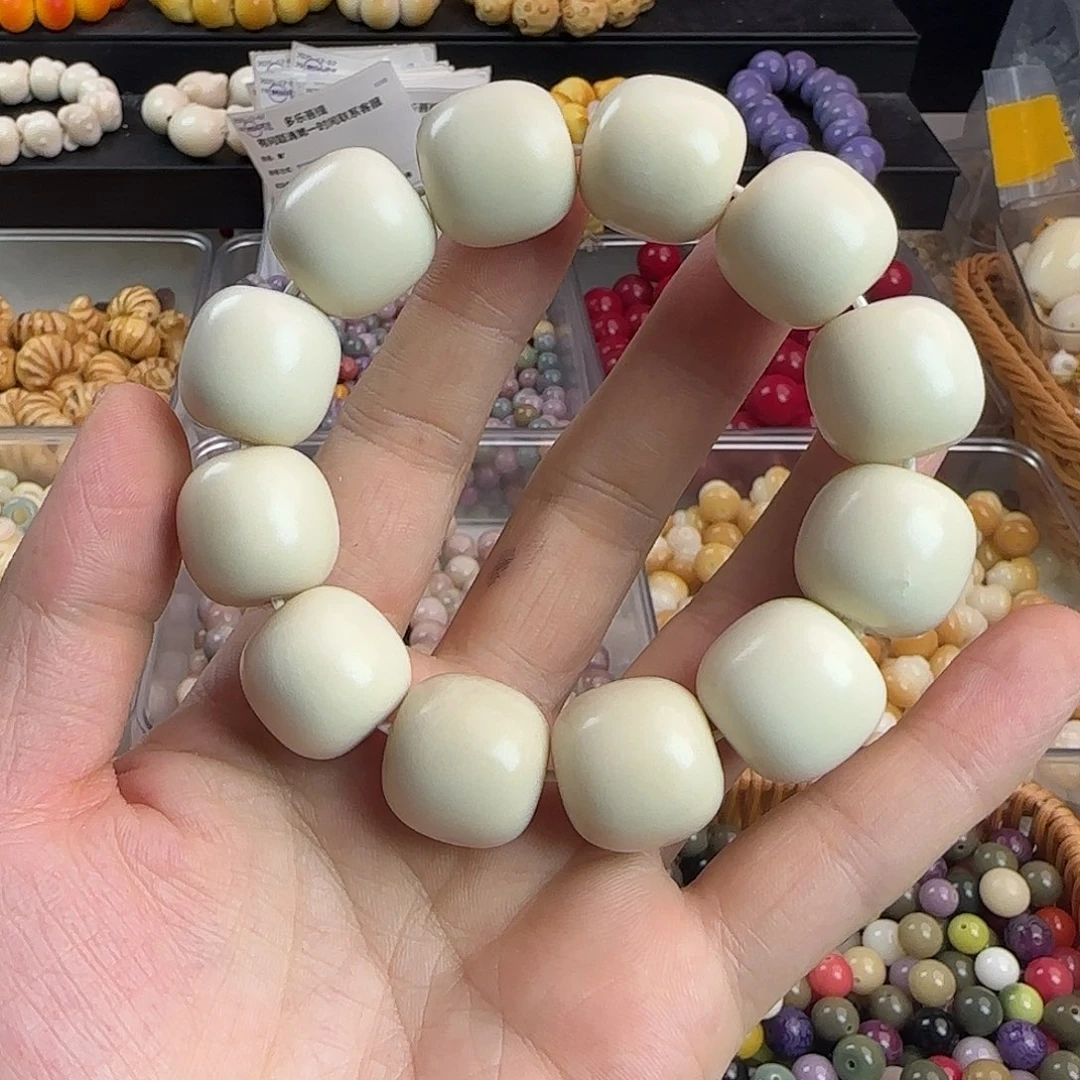 菩提根/象牙果手串微瑕疵卡20白桶手串一条