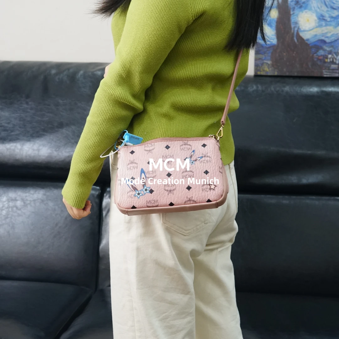 95新 MCM 粉色斜挎包/WJ12408597/8597优