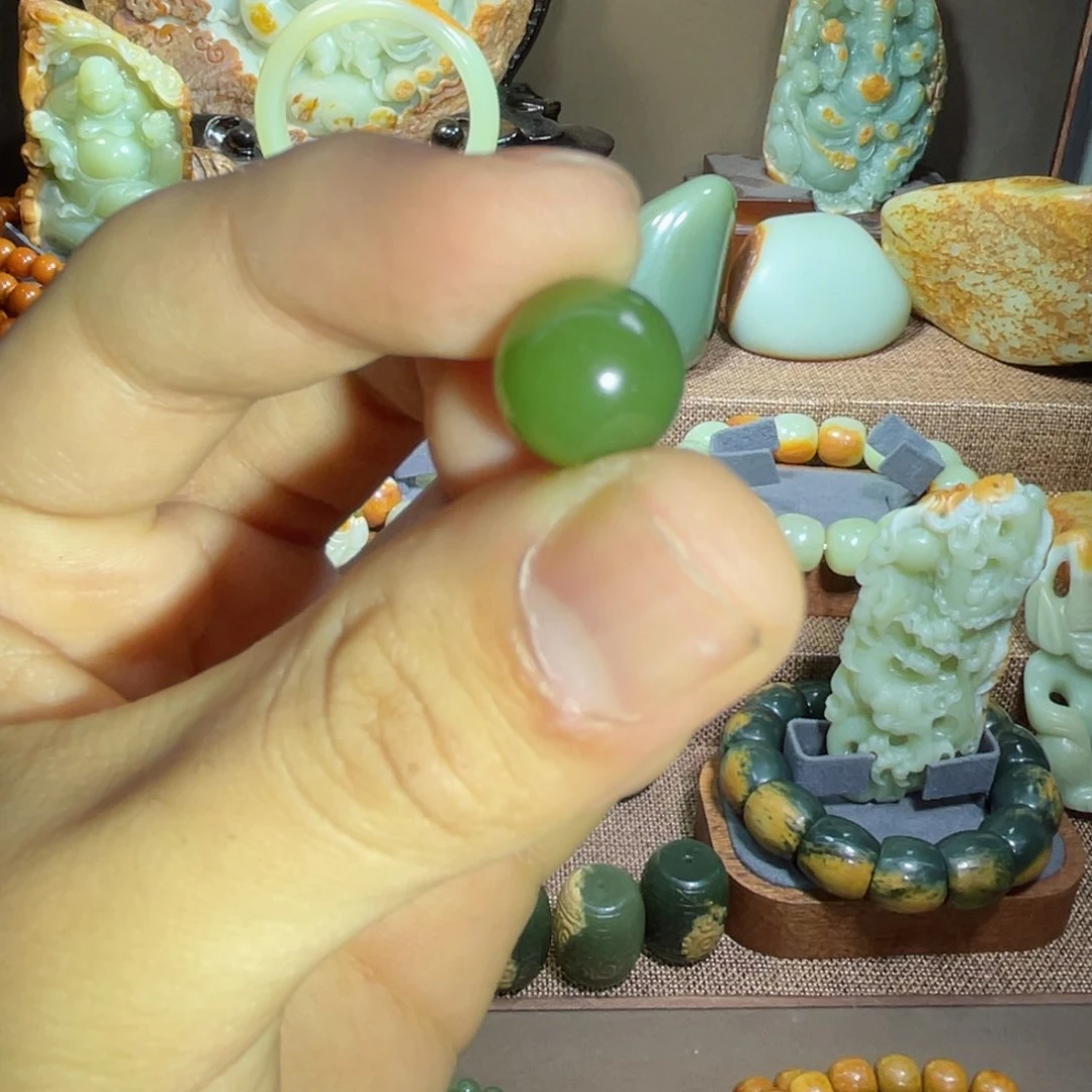 岫岩河磨玉（透闪石质玉）弹珠未镶嵌卖****孩