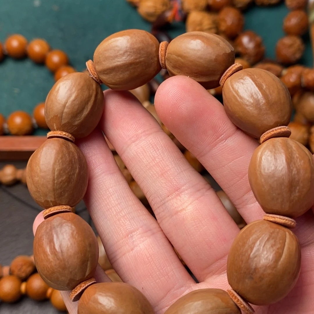 橄榄核吊坠嘚*嘚橄榄核