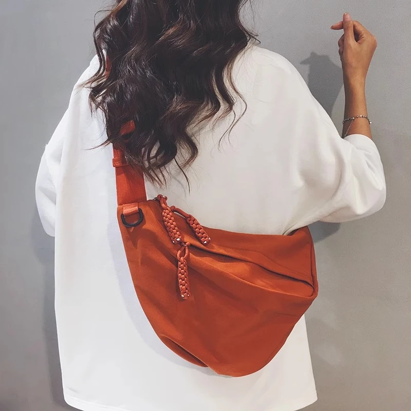 男女同款潮帆布包女2025新款大容量胸包休闲斜挎饺包运动单肩背包