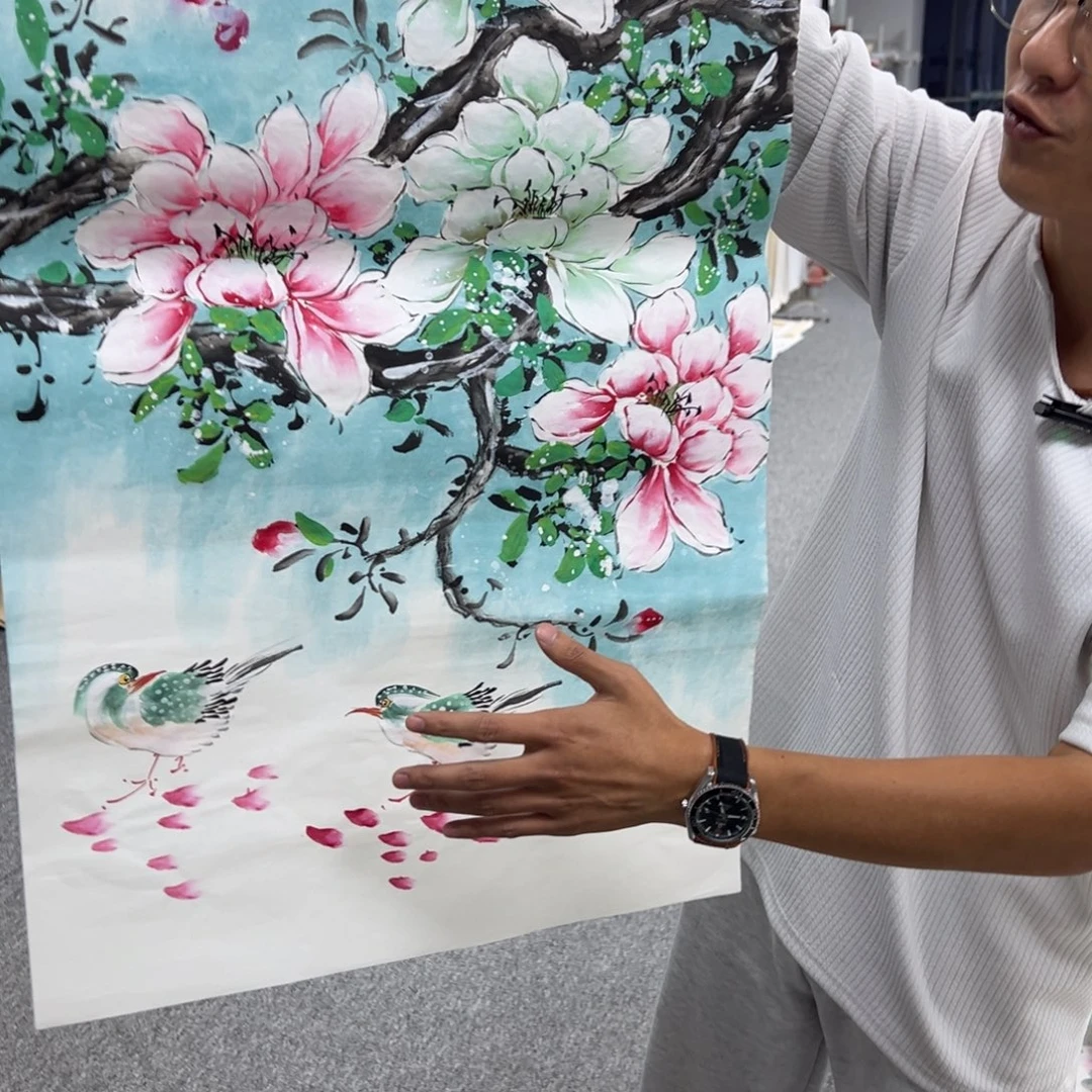 国画卖字画的小男孩