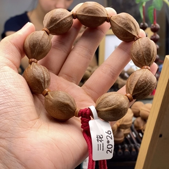 手串橄榄核。****。梅林铁