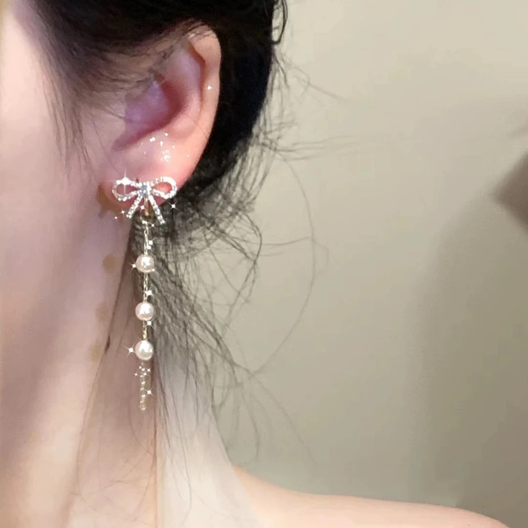 铜合金耳饰 轻奢公主范甜美蝴蝶结锆石长流苏无耳洞