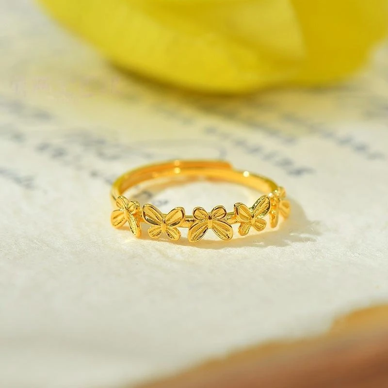 足银戒指 足银戒指   足银五只蝴蝶开口戒指清新简约
