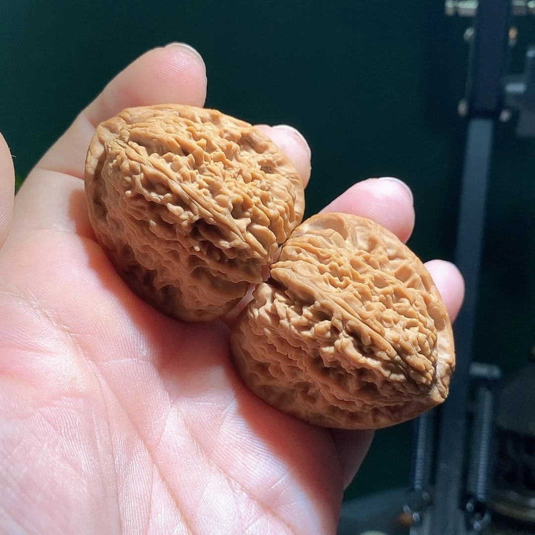 昔***归把件文玩核桃42三角疆