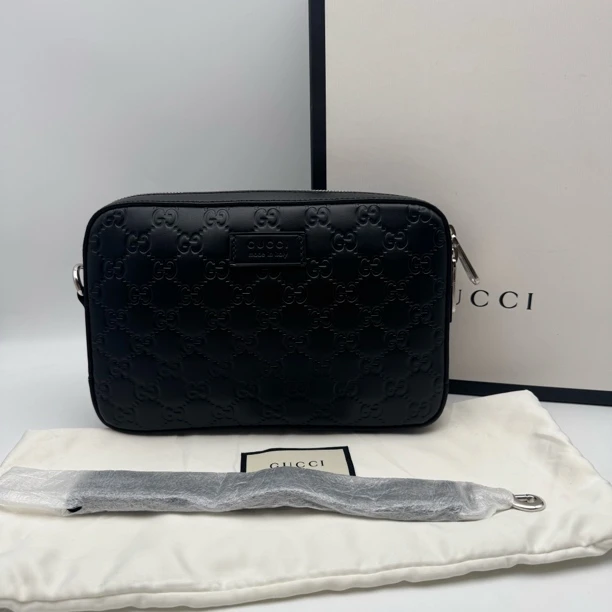 99新 GUCCI/古驰 黑色压花手拿包/男士2746经典