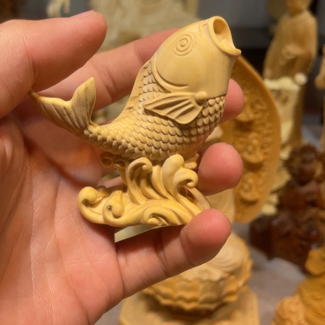黄杨木微瑕鱼把件