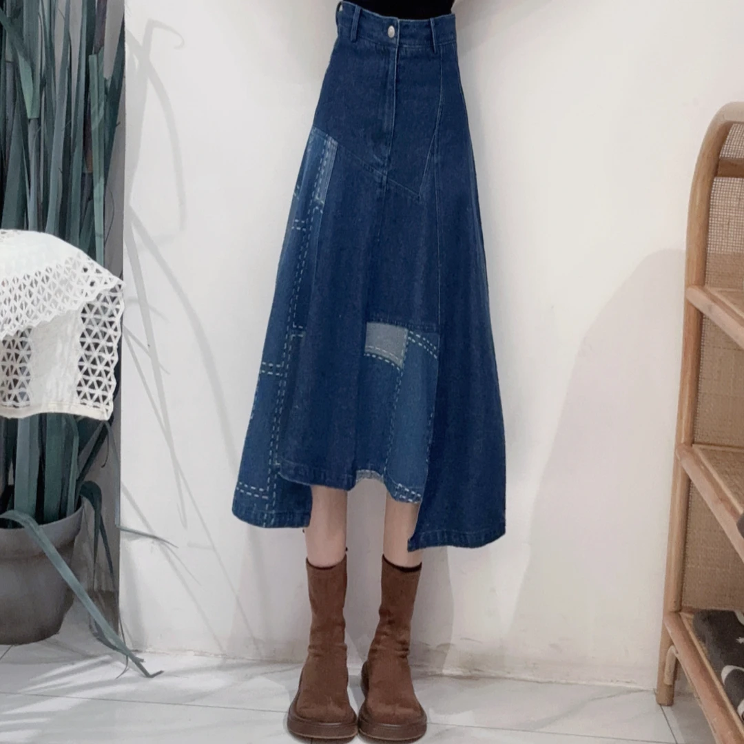 PC31230335复古牛仔蓝下摆不规则设计百搭时尚纯棉面料长款半身裙