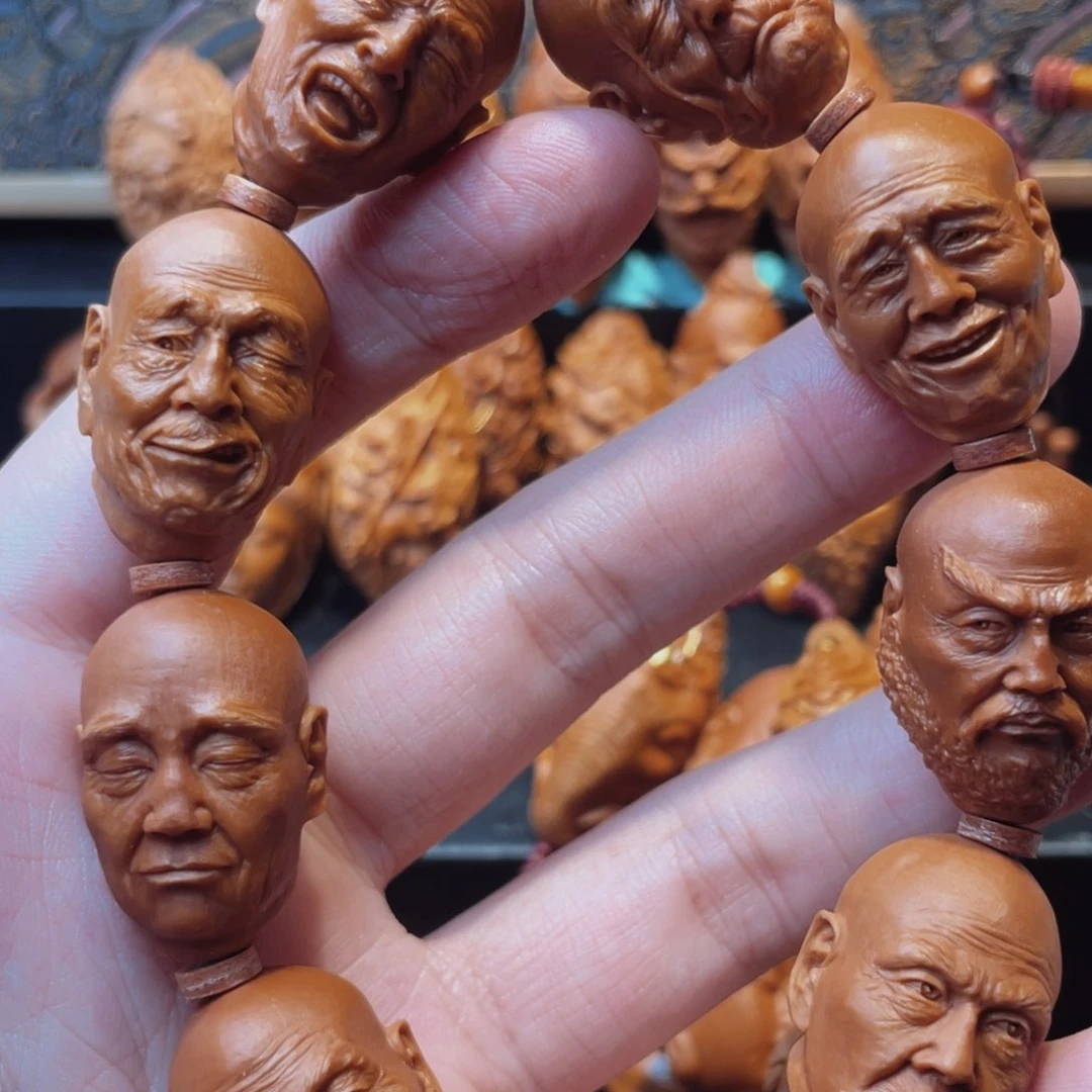 橄榄核吊坠九尊者