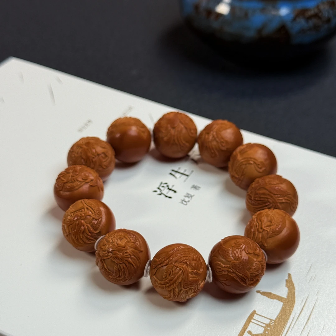 橄榄核精品正圆光珠浮雕龙凤呈祥文玩手串