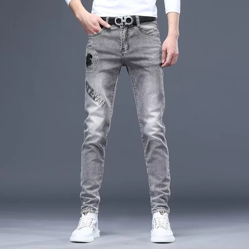 原宿ins青春流行高端男士小脚牛仔裤印花水洗潮长裤日系高弹百搭