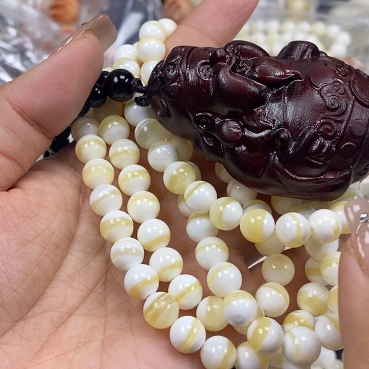 Y***a香榧木花梨木，08金腰带108