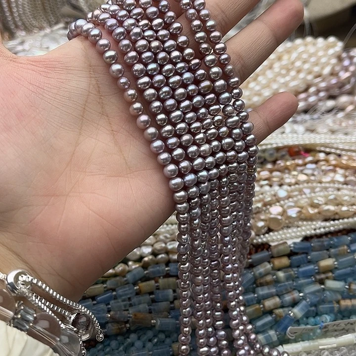玛瑙/玉髓未镶嵌珠宝半成品一条5-6mm左右椭圆紫珍珠
