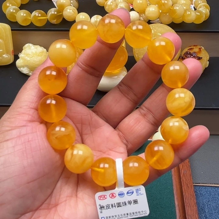 琥珀未镶嵌珠宝奇石M79号14.9+鸡油红妖花