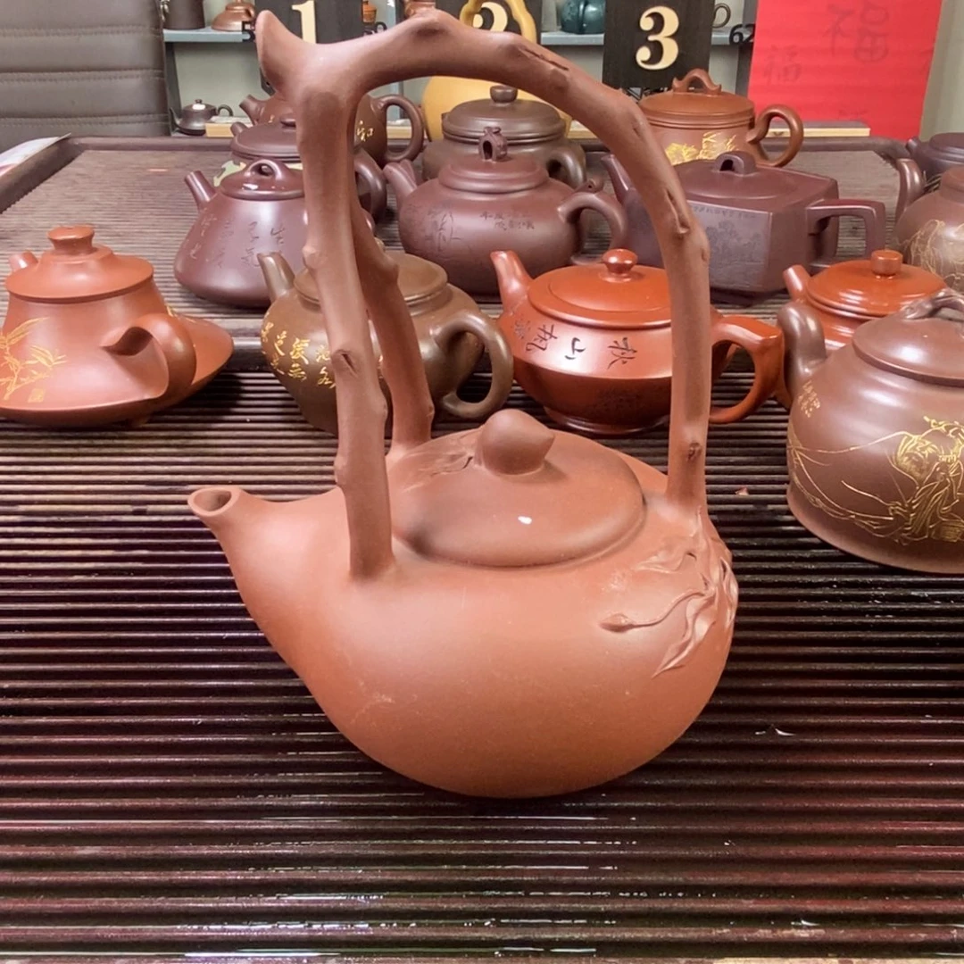 紫砂茶壶白21 寿桃提梁 紫泥