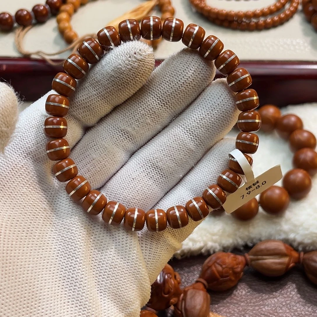 橄榄核手串/手链0.79核尖核银孔道正三花镶嵌银管