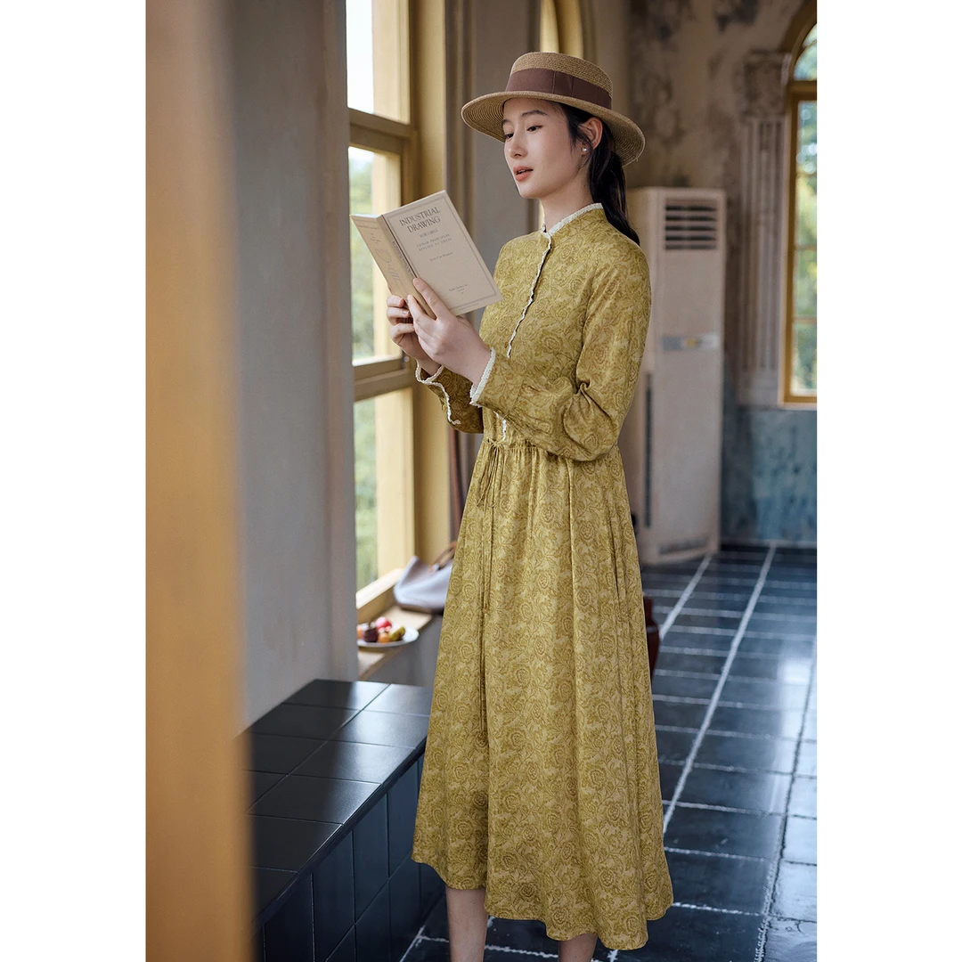 红念黄色印花连衣裙女长袖修身秋装2025年流光风优雅大摆长裙子