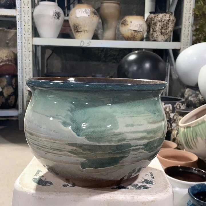紫砂花盆正品口25高18。z z z z
